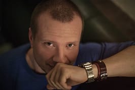 a man wearing distance bracelets
